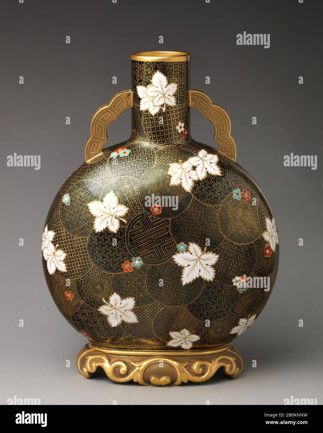 Worcester factory, Moon flask with white flower motif on raised foot with flat handles, British, Worcester, Worcester factory (British, 1751–2008), 1879, British, Worcester, Bone china, confirmed: 14 9/16 × 10 7/8 × 5 3/4 in. (37 × 27.6 × 14.6 cm), Ceramics-Porcelain Stock Photo