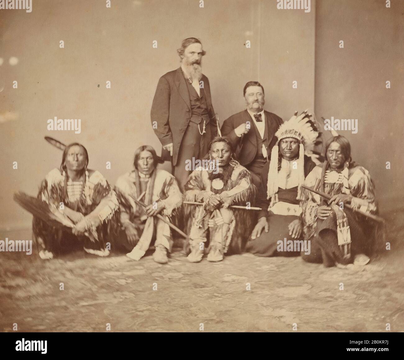 Mathew B. Brady, General J. E. Smith and Indians, Mathew B. Brady (American, born Ireland, 1823?–1896 New York), 1870s, Albumen silver print from glass negative, Image: 6 15/16 × 7 15/16 in. (17.6 × 20.1 cm), Mount: 10 13/16 × 13 7/8 in. (27.5 × 35.2 cm), Photographs Stock Photo