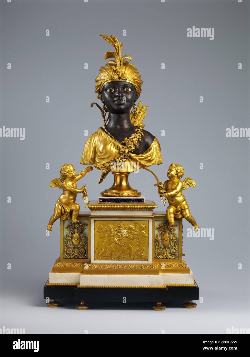 Clockmaker: Jean-Baptiste-André Furet, Mantel clock with musical movement, French, Paris, Clockmaker: Jean-Baptiste-André Furet (French, ca. 1720–1807), ca. 1784, French, Paris, Case: gilded and lacquered bronze and marble; Movement (in bust): brass and steel with enameled hour and minute chapter rings; Miniature organ with pipes and bellows (in base): brass, steel, and leather, Overall: 29 × 16 1/4 × 9 in. (73.7 × 41.3 × 22.9 cm), Horology Stock Photo
