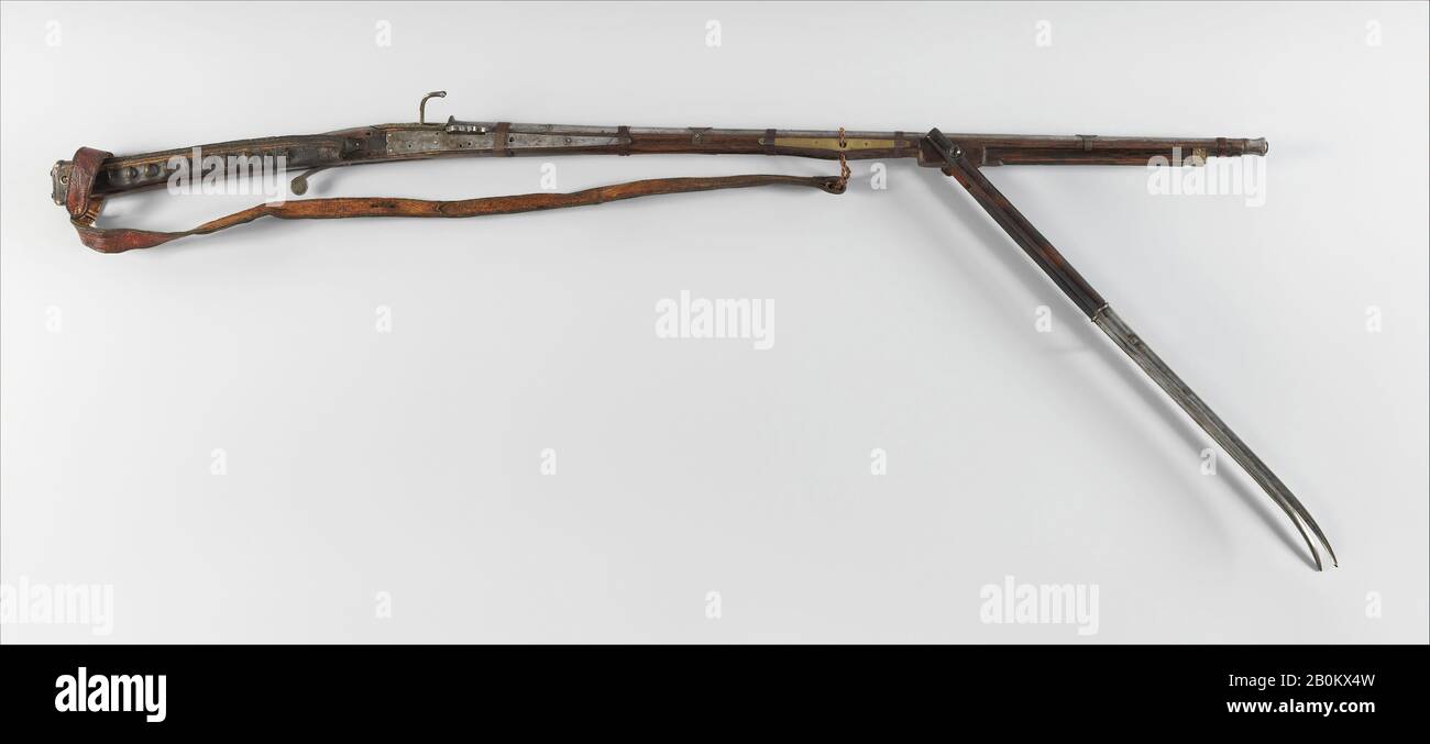 Matchlock Musket, Tibetan, 19th century, Tibetan, Iron, wood, leather, brass, copper, L. 58 3/4 in. (149.2 cm); L. of barrel 39 1/8 in. (99.4 cm); Cal. .55 in. (14 mm), Firearms-Guns-Matchlock Stock Photo