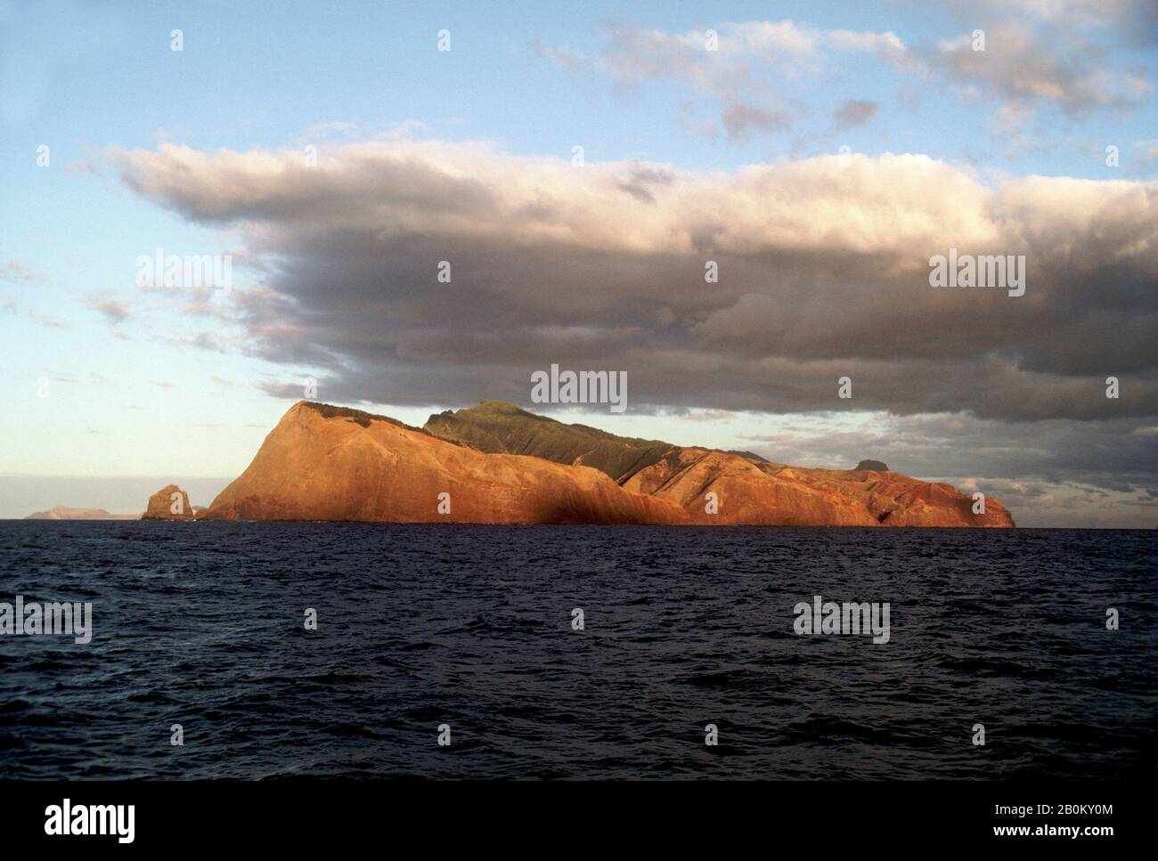 CHILE, JUAN FERNANDEZ ISLANDS, VIEW OF SOUTH-EASTERN COAST OF ROBINSON CRUSOE ISLAND FROM SEA Stock Photo