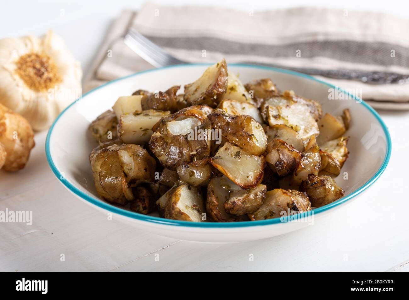 Spicy fried Jerusalem artichoke with garlic Stock Photo Alamy