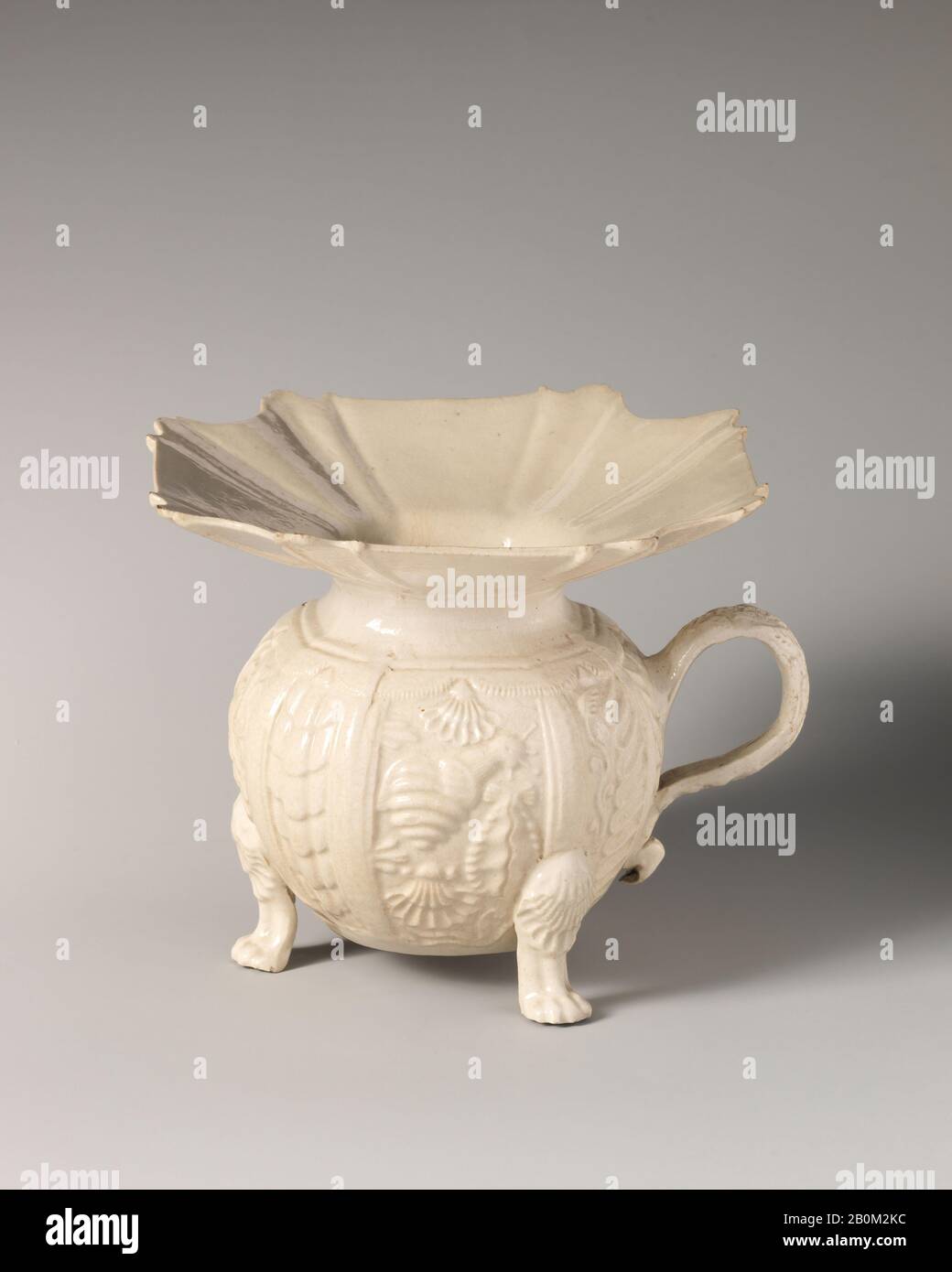 Spitoon, British, Staffordshire, ca. 1750, British, Staffordshire, Salt-glazed stoneware, Overall: 1 5/8 × 2 3/4 in. (4.1 × 7 cm), Ceramics-Pottery Stock Photo