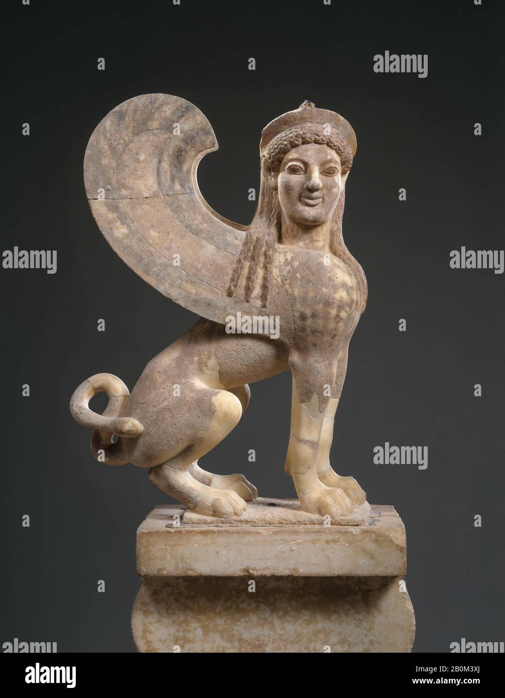 Marble capital and finial in the form of a sphinx, Greek, Attic, Archaic, Date ca. 530 B.C., Greek, Attic, Marble, Parian, H. with akroterion 56 1/8 in. (142.6 cm), Stone Sculpture Stock Photo