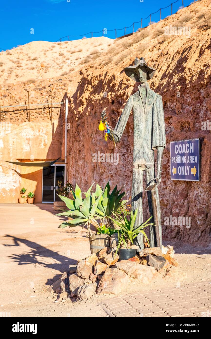 Outdoor metal sculpture of an old fashioned miner in Coober Pedy, South Australia Stock Photo