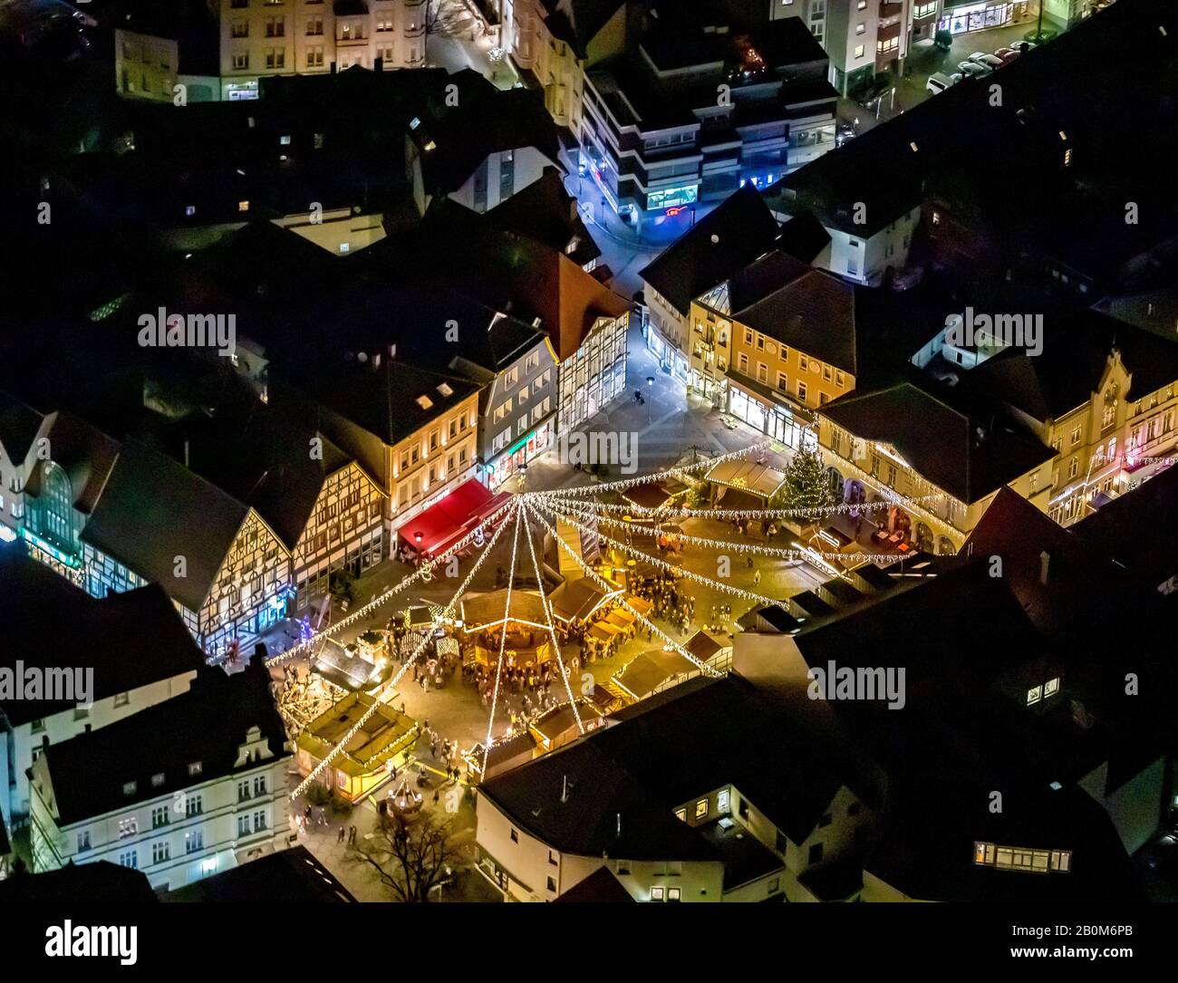 Aerial photo flight over the nocturnal Unna,market, market place of the city of Unna, Christmas market with Christmas lighting, lamp garlands, Unna, R Stock Photo