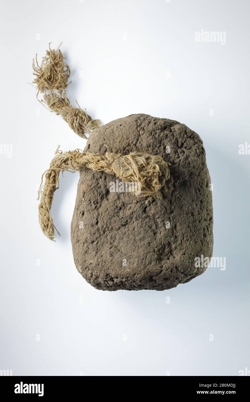 Loom weight, New Kingdom, Ramesside, Dynasty 19–20, ca. 1295–1070 B.C., From Egypt, Memphite Region, Lisht North, Cemetery, 1913–14, Mud, string, H. 10 × W. 8.1 cm (3 15/16 × 3 3/16 in Stock Photo