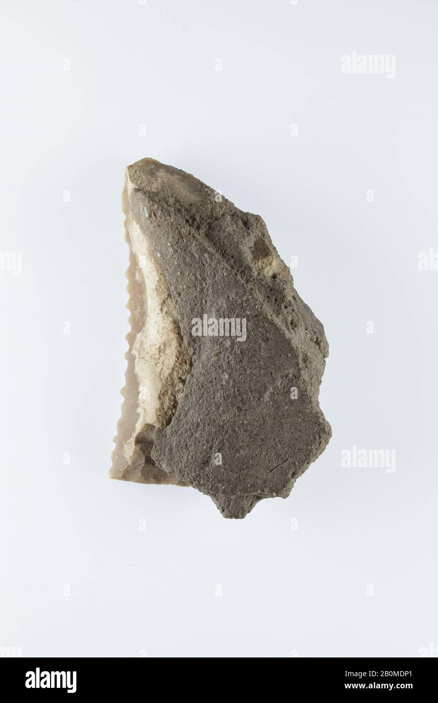 Sickle Insert, New Kingdom, Ramesside, Dynasty 19–20, ca. 1186–1070 B.C., From Egypt, Memphite Region, Lisht North, Cemetery, 1908–10, Flint, adhesive (lime plaster ?), L. 6.8 × W. 4.2 × Th. 1.6 cm, Wt. 45.3g (2 11/16 × 1 5/8 × 5/8 in., 1.598oz Stock Photo