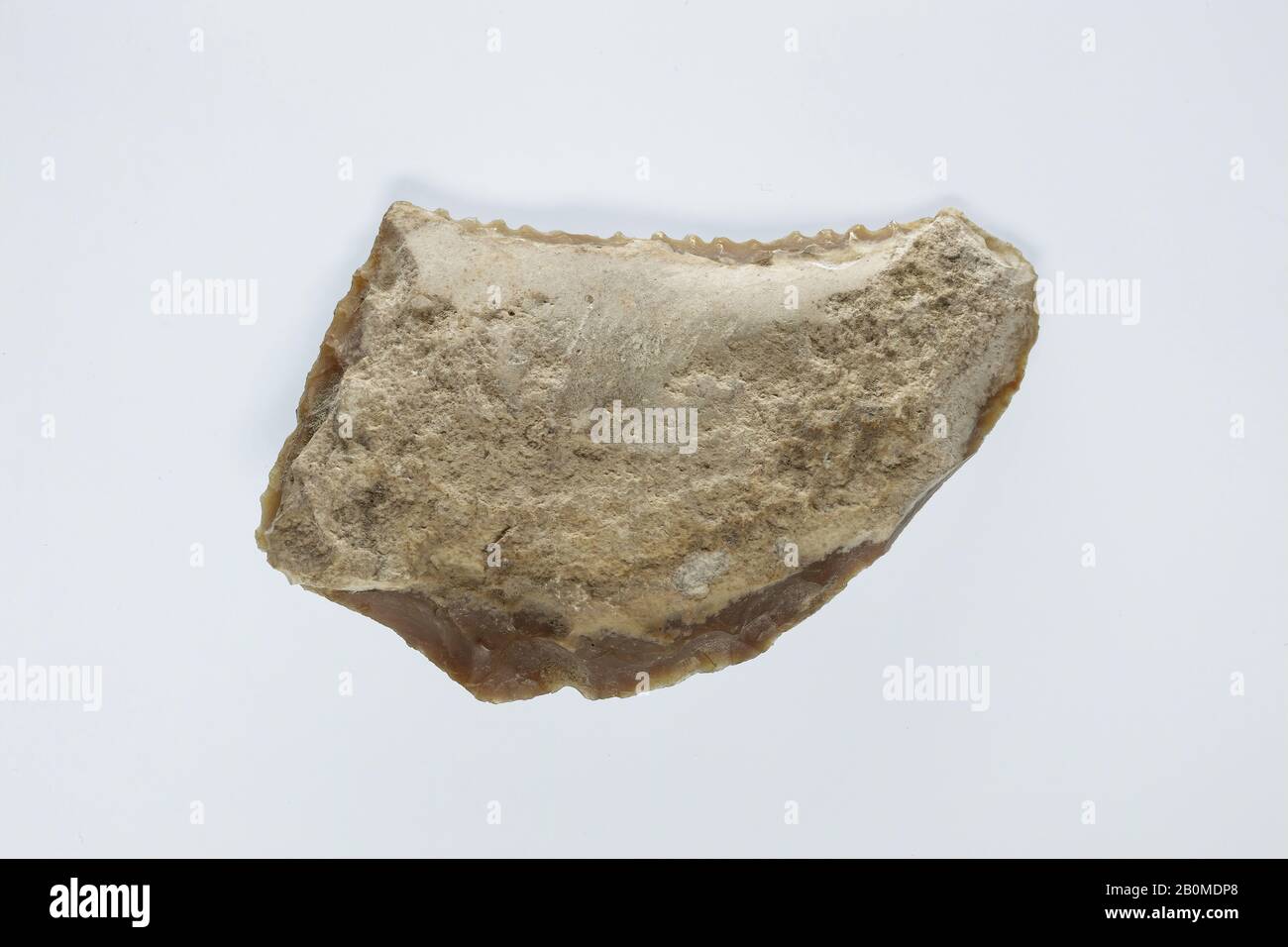 Sickle Insert, New Kingdom, Ramesside, Dynasty 19–20, ca. 1186–1070 B.C., From Egypt, Memphite Region, Lisht North, Cemetery, 1908–10, Flint, adhesive (lime plaster ?), L. 8.4 × W. 5.1 × Th. 1.3 cm, Wt. 54.6g (3 5/16 × 2 × 1/2 in., 1.926oz Stock Photo