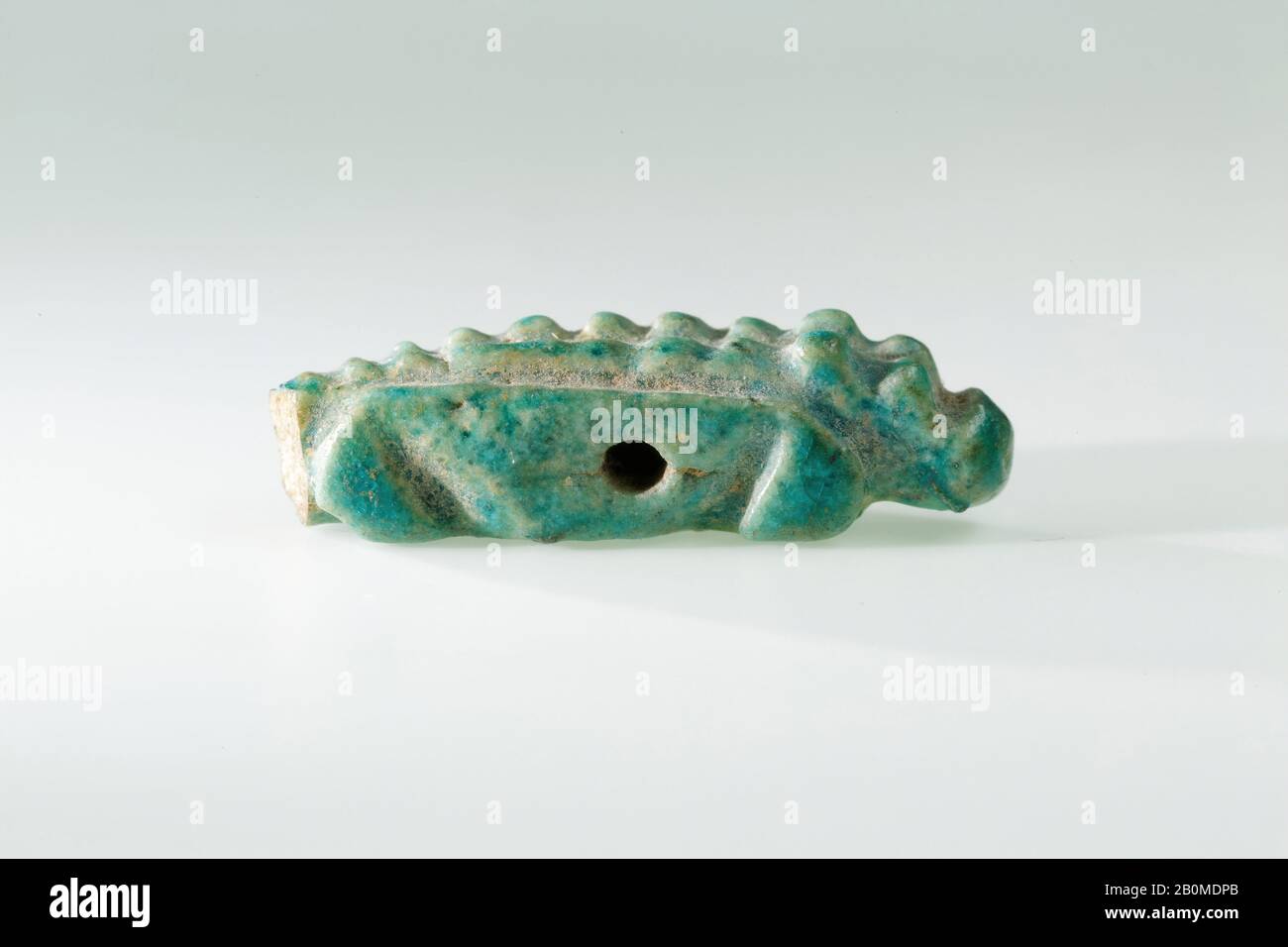 Crocodile amulet, New Kingdom, Ramesside, Dynasty 19–20, ca. 1295–1070 B.C., From Egypt, Memphite Region, Lisht North, Cemetery, Faience, L. 2.4 cm (15/16 in.); W. 0.8 cm (5/16 in.); H. 0.7 cm (1/4 in Stock Photo