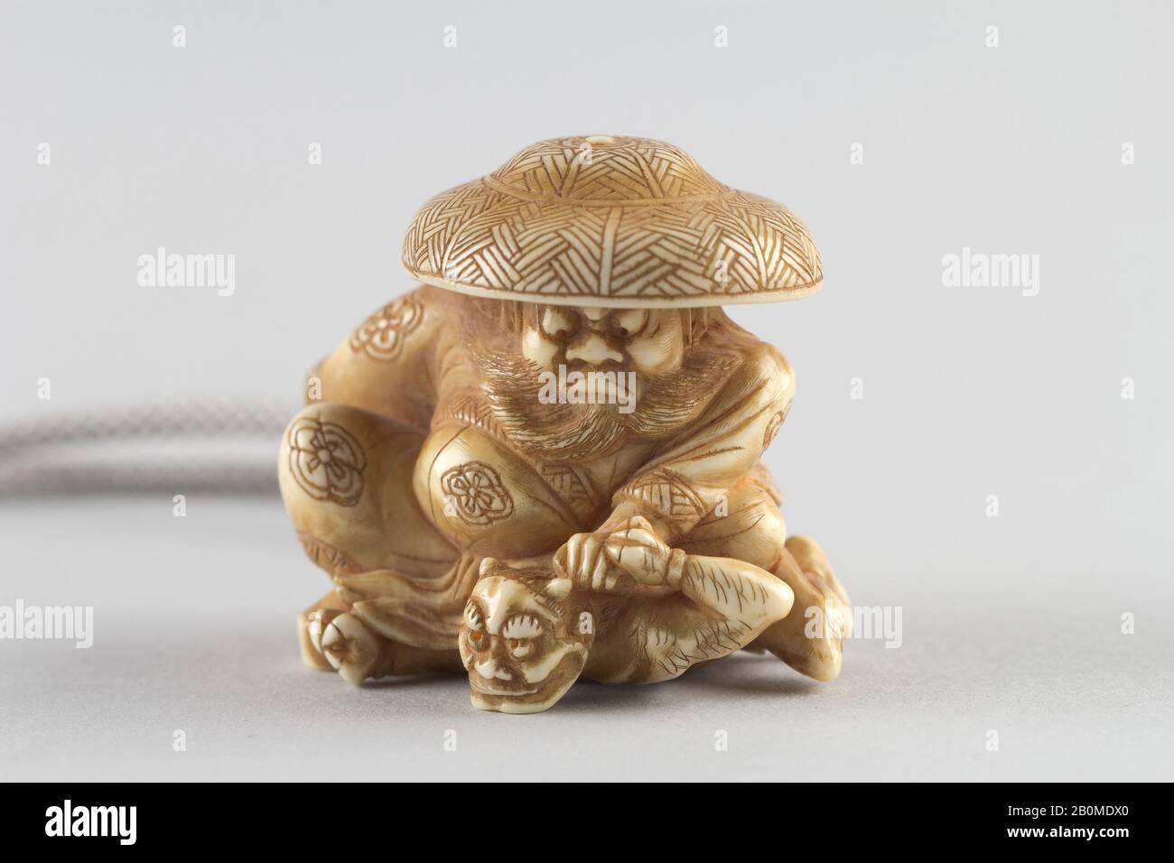 Japanese ivory color bone netsuke Buddhist Boy Sits with Prayer Beads