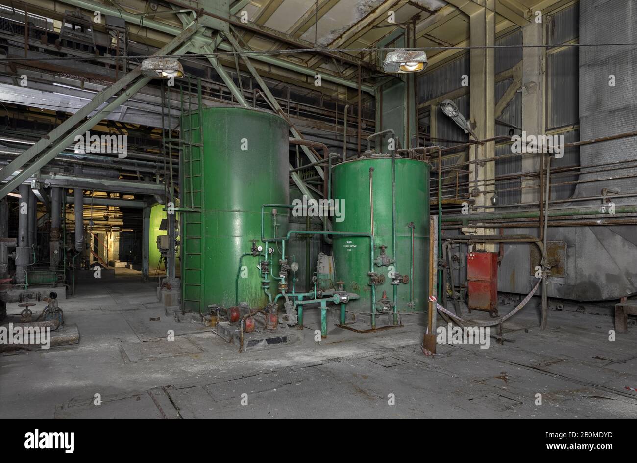 Large green tanks with secondary water at the plant Stock Photo