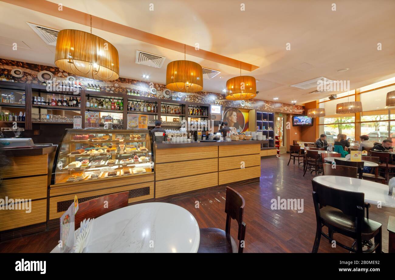 MOSCOW - SEPTEMBER 2014: Bar with a display case in a popular Russian cafe 'Shokoladnitsa' Stock Photo