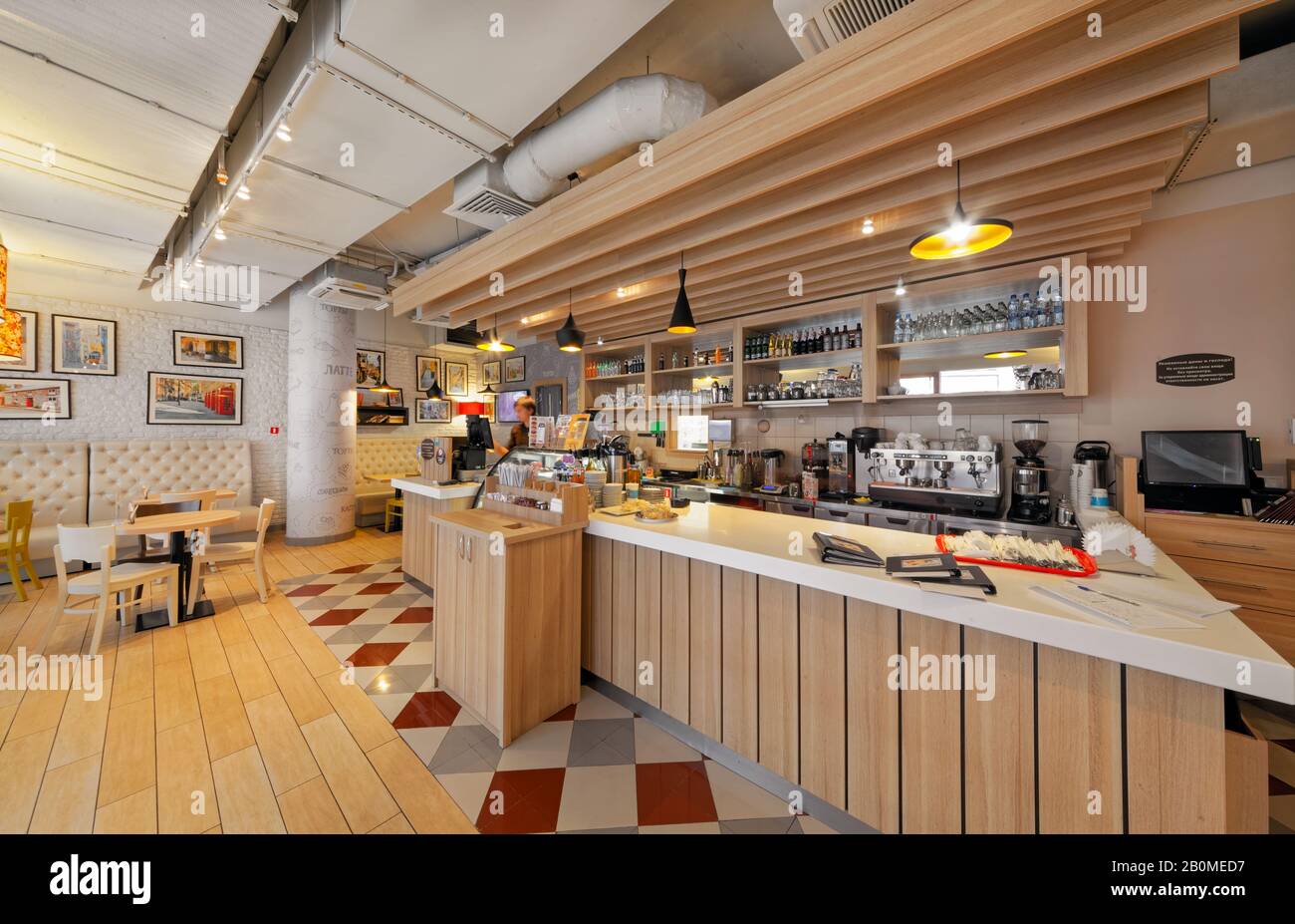MOSCOW - SEPTEMBER 2014: The modern interior of a popular Russian coffee house 'Shokoladnitsa'. Contemporary style counter in the hall Stock Photo