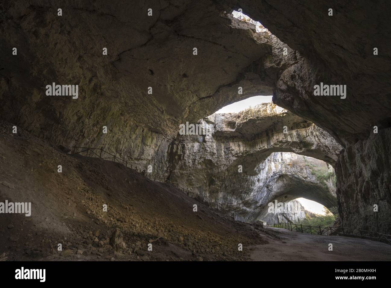 Devetashka Cave triple hole in Bulgaria Stock Photo