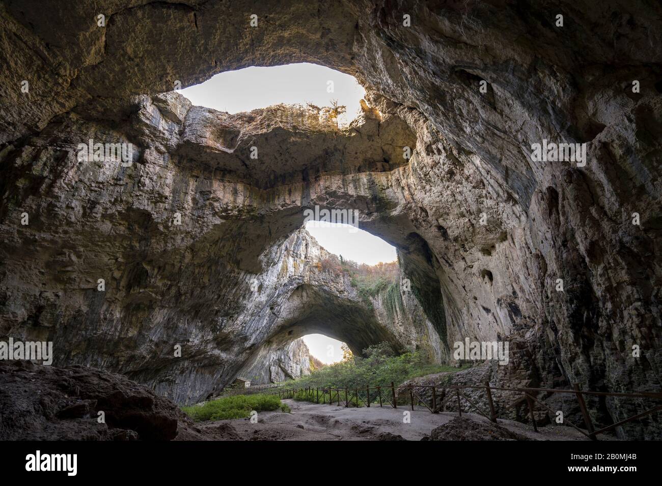 Devetashka Cave triple hole in Bulgaria Stock Photo
