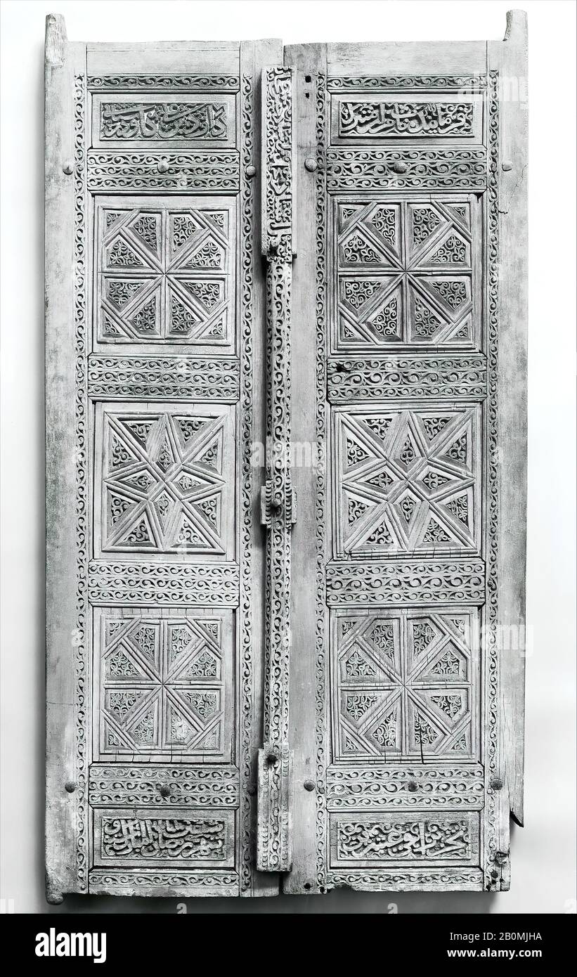 Pair of Carved Doors, Door, dated 1466, Made in Iran, Wood (teak); carved,  H. 59 1/4 in. (150.5 cm), W. 32 in. (81.3 cm), Gr. D. 3 1/2 in. (8.9 cm),  Wt. 48 lbs (21.8 kg), Wood Stock Photo - Alamy