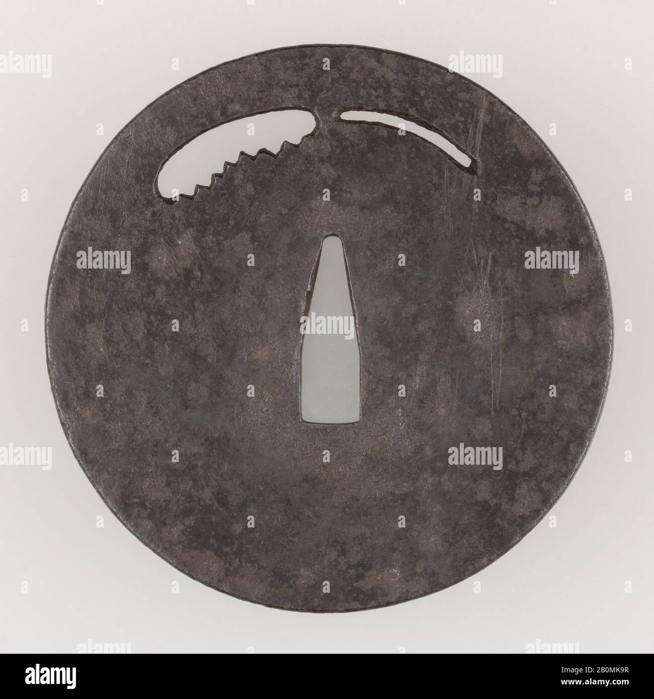 Sword Guard (Tsuba), Japanese, late 14th century, Japanese, Iron, copper, Diam. 3 3/4 in. (9.5 cm); thickness 1/8 in. (0.3 cm); Wt. 5.5 oz. (155.9 g), Sword Furniture-Tsuba Stock Photo