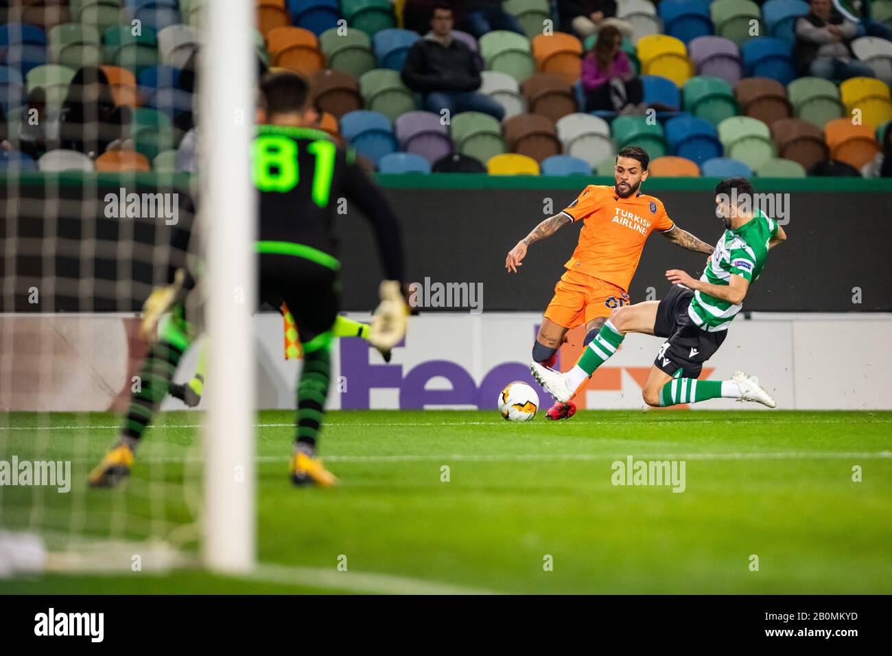 Junior Caicara of Istanbul Basaksehir and Luis Neto of Sporting CP are seen in action during the UEFA Europa League 1st leg of Round of 32 match between Sporting CP and Istanbul Basaksehir at Jose Alvalade Stadium in Lisbon.(Final score; Sporting CP 3:1 Istanbul Basaksehir) Stock Photo