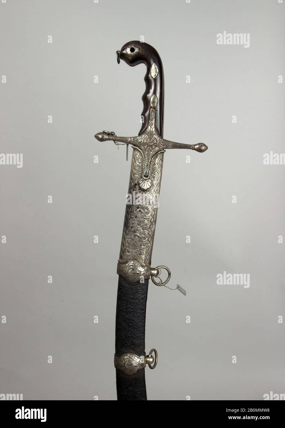 Sword (Kilij) with Scabbard, Turkish, 19th century, Turkish, Steel, horn, silver, H. with scabbard 35 1/4 in. (89.5 cm); H. without scabbard 33 in. (83.8 cm); W. 6 in. (15.2 cm); Wt. 1 lb. 6.5 oz. (637.9 g); Wt. of scabbard 1 lb. 4.3 oz. (575.5 g), Swords Stock Photo