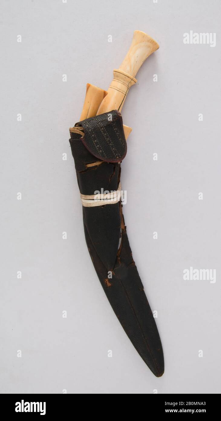 Knife (Kukri) with Sheath, Two Small Knives and Pouch, Indian or Nepalese, Gurkha, 19th century, Indian or Nepalese, Gurkha, Steel, ivory, leather, Knife (a); H. with sheath 16 13/16 in. (42.7 cm); H. without sheath 16 13/16 in. (42.7 cm); W. 1 1/2 in. (3.8 cm); Wt. 14.2 oz. (402.6 g); sheath (b); Wt. 3.3 oz. (93.6 g); small knife (c); H. 6 5/16 in. (41.4 cm); W. 1 1/16 in. (2.7 cm); Wt. 2.3 oz. (65.2 g); small knife (d); H. 6 13/16 in. (17.3 cm); W. 1 3/16 in. (3 cm); Wt. 2 oz. (56.7 g), Knives Stock Photo