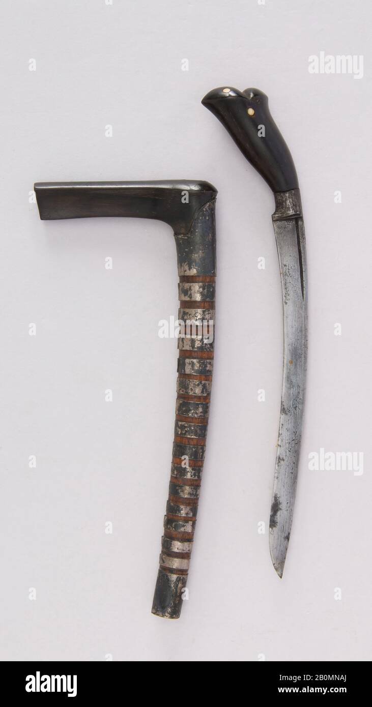 Knife (Bade-bade) with Sheath, Malayan, 18th–19th century, Malayan, Horn, bone, silver, H. with sheath 10 1/4 in. (26 cm); H. without sheath 8 15/16 in. (22.7 cm); L. of blade 6 1/2 in. (16.5 cm); W. 1 3/4 in. (4.5 cm); Wt. 2.3 oz. (65.2 g); Wt. of sheath 1.5 oz. (42.5 g), Knives Stock Photo