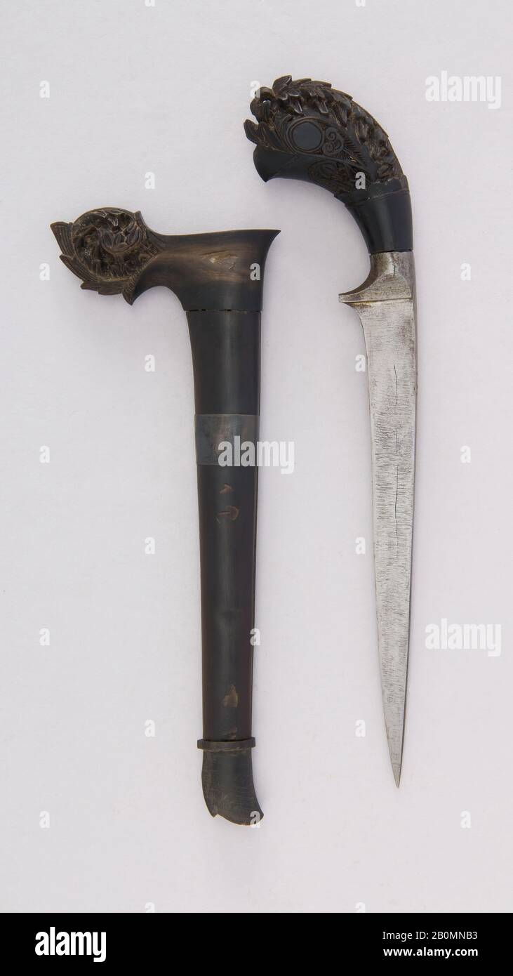 Knife with Sheath, Sumatran, 18th–19th century, Sumatra, Sumatran, Wood, steel, L. with sheath 9 11/16 in. (24.6 cm); L. without sheath 8 7/16 in. (21.4 cm); W. 2 in. (5.1 cm); Wt. 2.5 oz. (70.9 g); Wt. of sheath 1.3 oz. (36.9 g), Knives Stock Photo