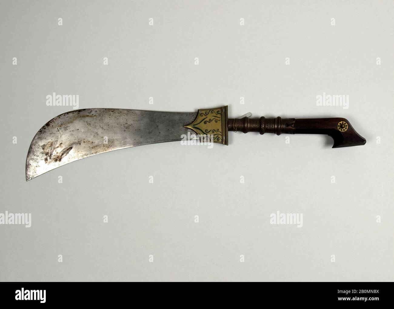Moplah Knife, Indian, Coorg, 18th–19th century, Indian, Coorg, Steel, brass, rosewood, H. 22 1/2 in. (57.2 cm); W. 2 3/4 in. (7 cm); Wt. 1 lb. 5.8 oz. (618 g), Knives Stock Photo