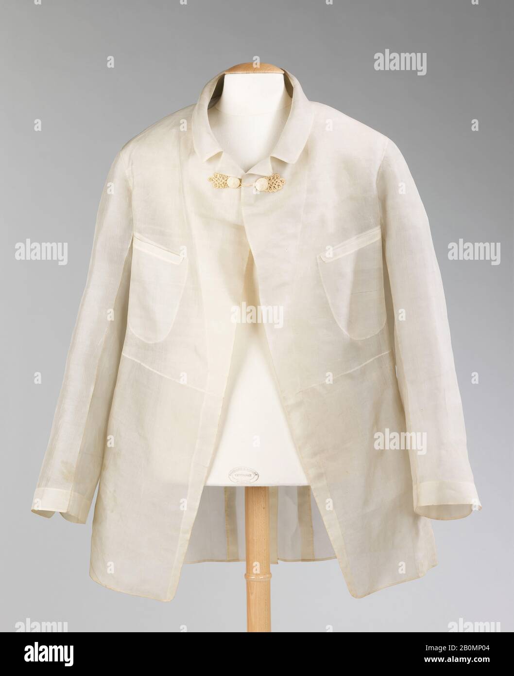 cream frock coat