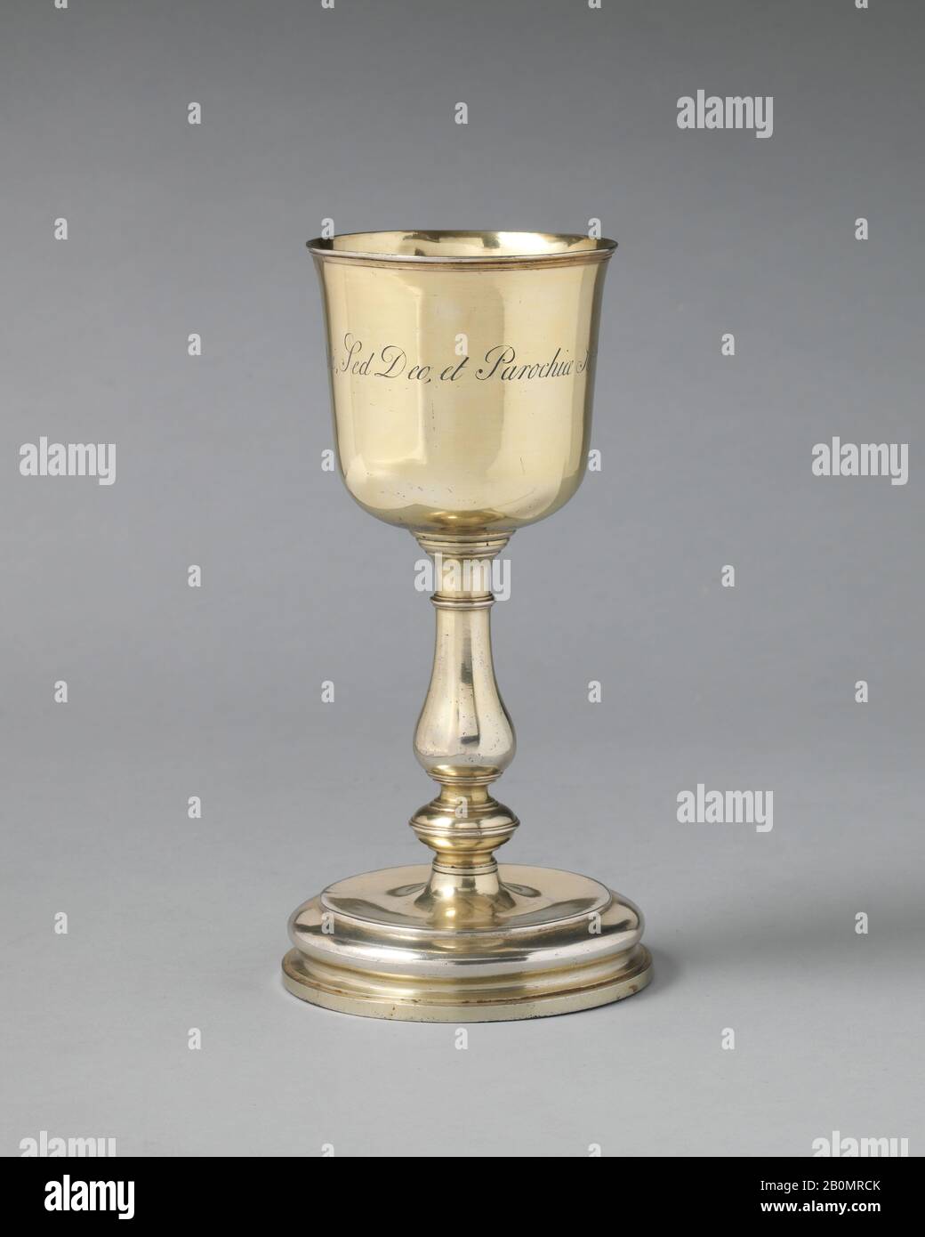 George Wickes, Communion cup, British, London, George Wickes (British, Bury St Edmunds, Suffolk 1698–1761 Thurston, Suffolk), 1733–34, British, London, Silver gilt, 7 5/8 × 3 1/4 in. (19.4 × 8.3 cm), Metalwork-Silver Stock Photo