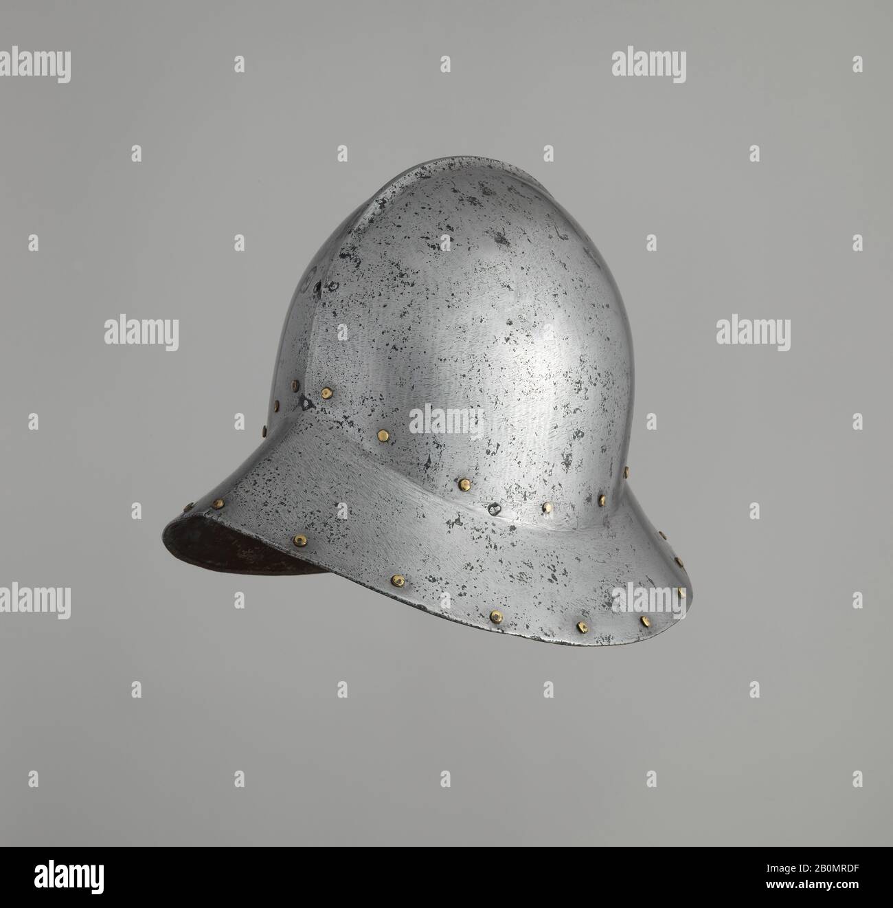 War Hat, Spanish, late 15th century, Spanish, Steel, brass, H. 9 3/4 in. (24.8 cm); W. 10 1/16 in. (25.6 cm); D. 13 in. (33 cm); Wt. 3 lb. 12 oz. (1697 g), Helmets Stock Photo