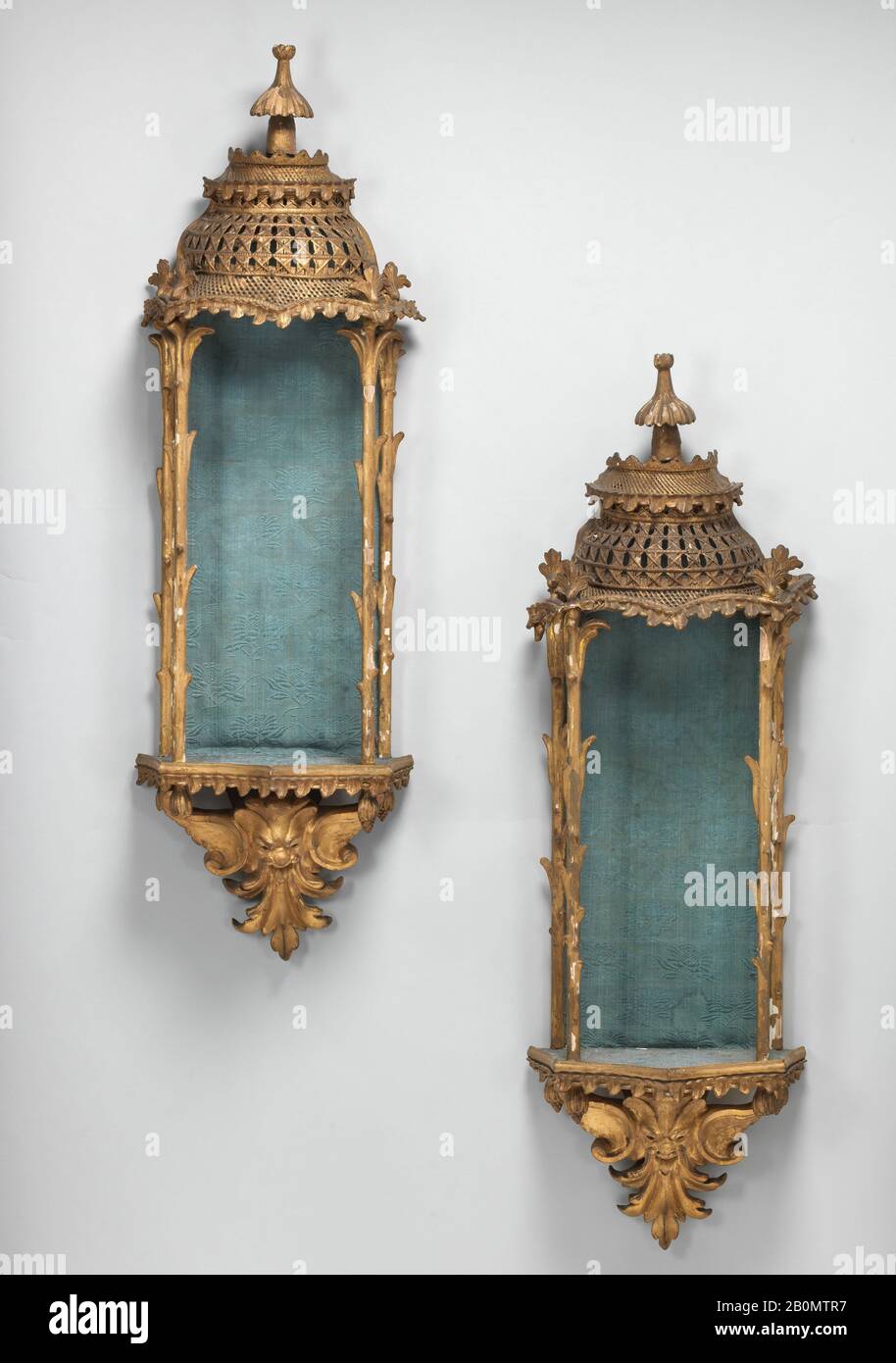 Pair of hanging niches, British, ca. 1750–55, British, Carved and gilded wood, composition, and caning, Overall (each): 38 × 11 × 7 1/8 in. (96.5 × 27.9 × 18.1 cm), Woodwork-Furniture Stock Photo