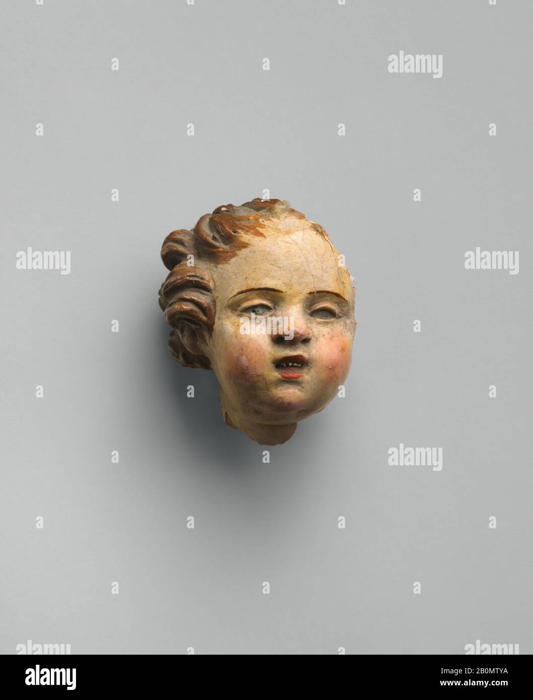 Cherub head fragment, Italian, second half 18th–mid-19th century, Italian, Terracotta, Overall: 1 1/2 × 1 1/4 × 3/4 in. (3.8 × 3.2 × 1.9 cm), Crèche Stock Photo