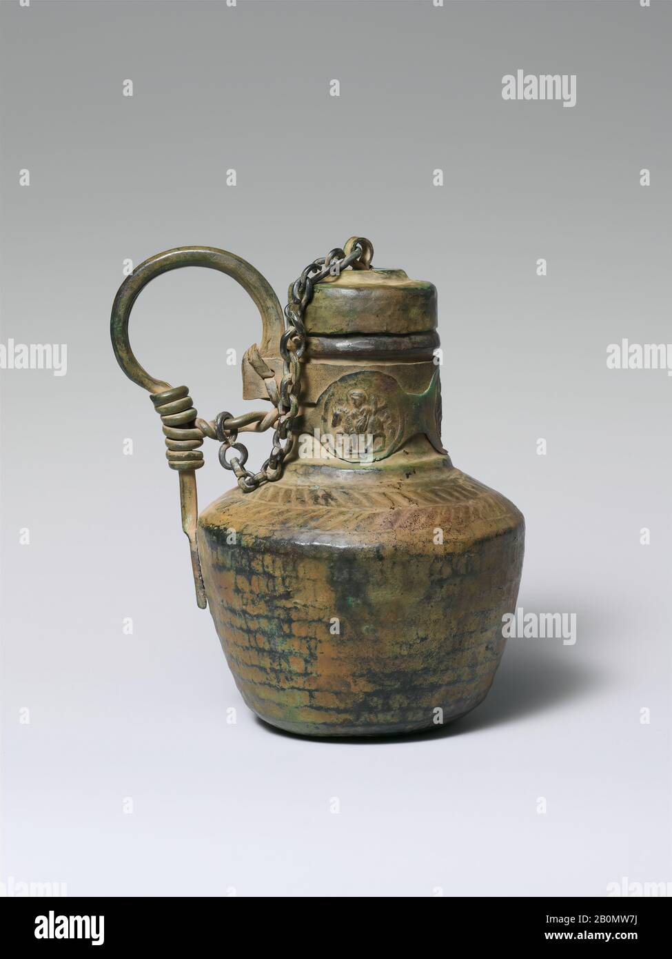 Jug with Medallions, Byzantine, 6th–8th century, Byzantine, Copper alloy, Overall: 4 15/16 x 4 x 3 3/8 in. (12.5 x 10.2 x 8.6 cm), Metalwork-Copper Stock Photo