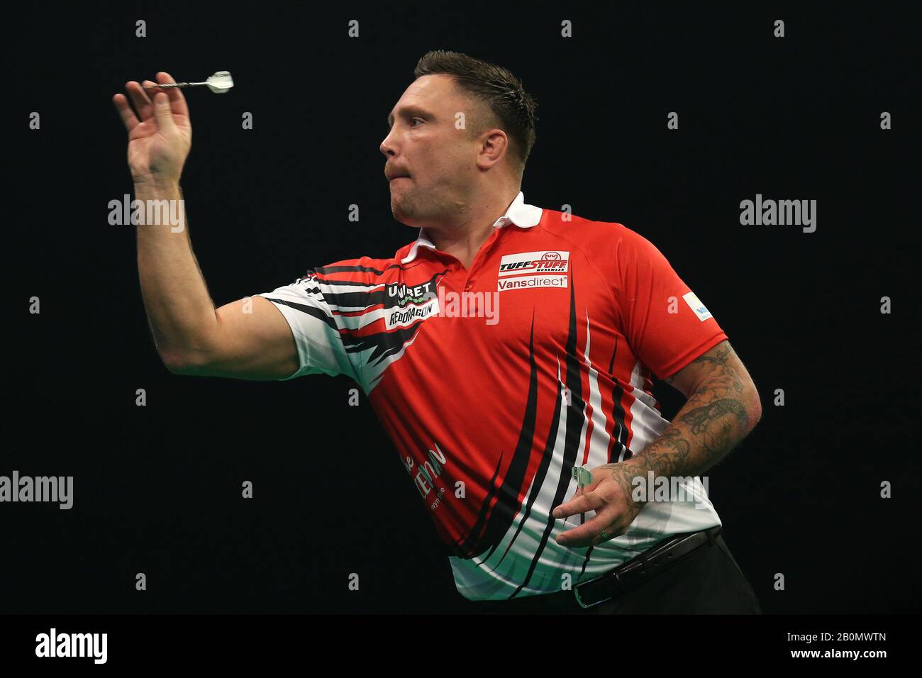 Cardiff, UK. 20th Feb, 2020. Gerwyn Price, the Welsh Darts player during  his match against Daryl Gurney, the Northern Irish Darts player. Unibet  Premier League Darts, night three event at the Motorpoint