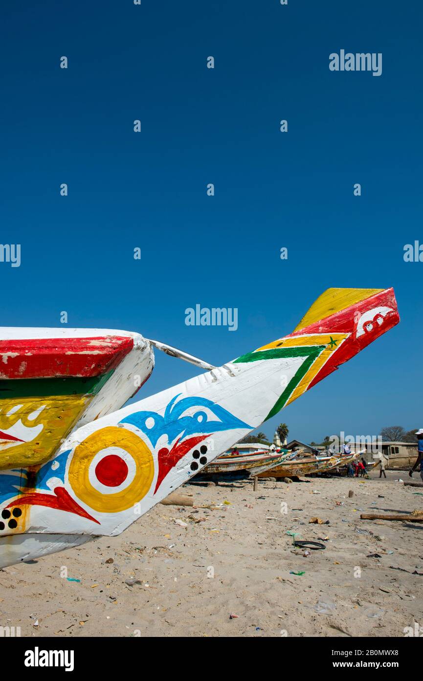 Colorful fishing boats on beach at Soumbedioune, one of the many fishing beaches of Dakar, Senegal, West Africa Stock Photo