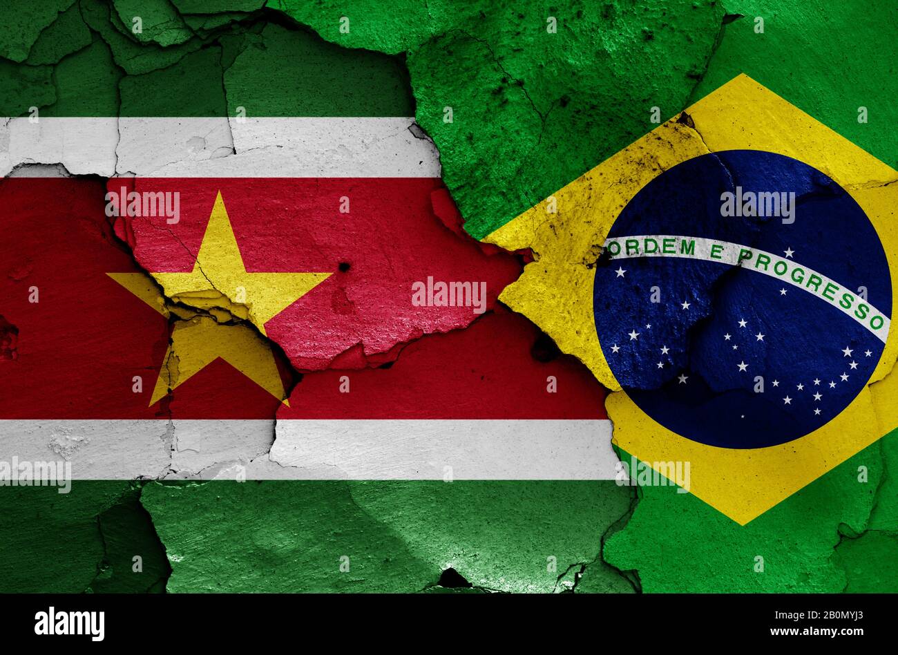 flags of Suriname and Brazil painted on cracked wall Stock Photo Alamy