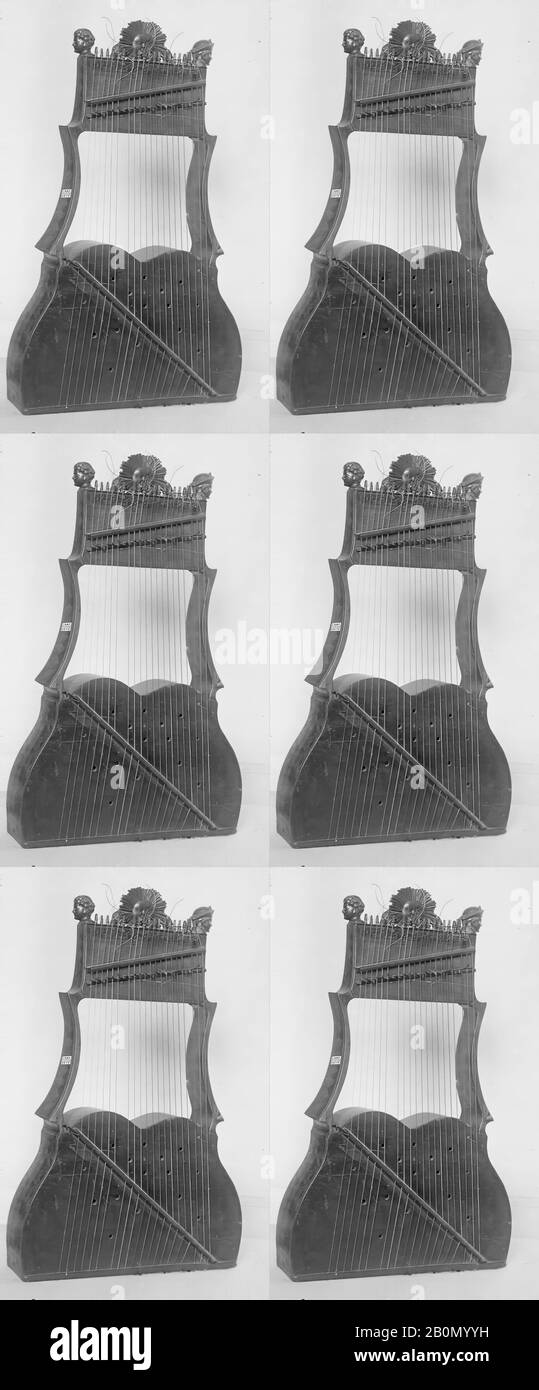 Harp Lyre, French, mid-19th century, France, French, Wood, metal, Total length 75.5 cm., Soundbox length (right/ center/ left: 31.2/ 27.9/ 30/1 cm., Body width (base/ top of soundbox/ top): 44.5/ 33.5/ 25.5 cm., Body depth (top/ top of soundbox/ foot): 5.1/ 10.5/ 11.5 cm., vibrating length of strings 59.5-31.5, Bridge height (bottom) 2.2 cm., Chordophone-Lute-plucked-fretted Stock Photo