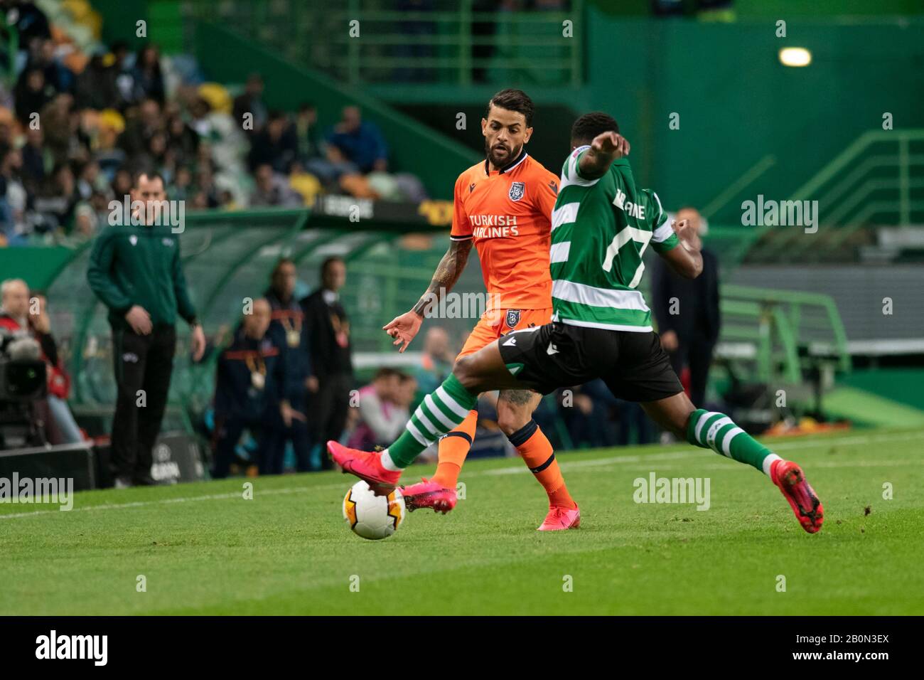 Istanbul Ba?ak?ehir FK player Júnior Caiçara (L) and Sporting CP player Jovane Cabral (R) are seen in action during the UEFA Europa League Match 2019/20, Sporting CP vs Istanbul Ba?ak?ehir FK at José Alvalade Stadium.(Final Score: Sporting CP 3 -1 Istanbul Ba?ak?ehir FK) Stock Photo