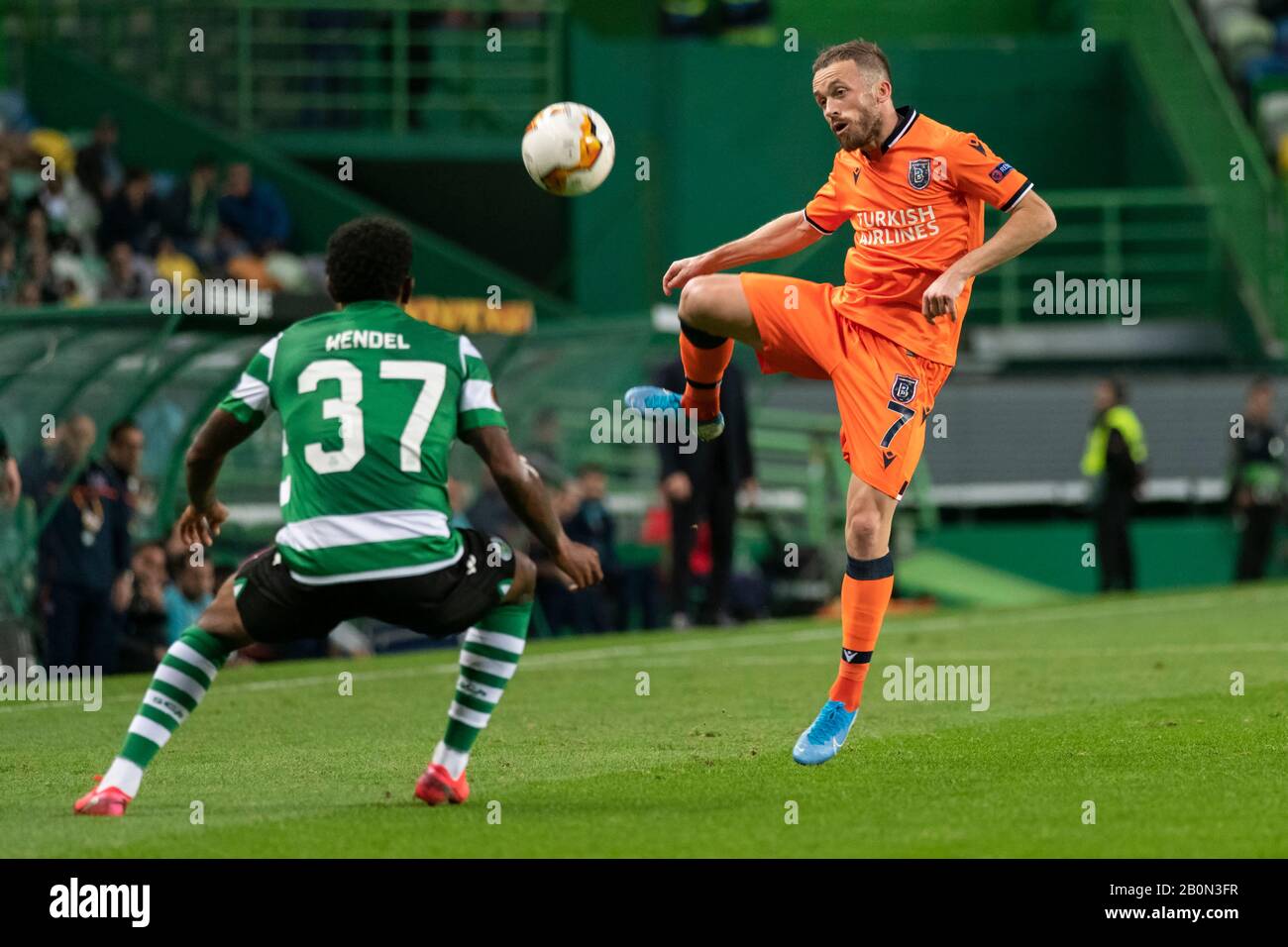 Istanbul Ba?ak?ehir FK player Edin Visca (R) and Sporting CP player Wendel (L) are seen in action during the UEFA Europa League Match 2019/20, Sporting CP vs Istanbul Ba?ak?ehir FK at José Alvalade Stadium.(Final Score: Sporting CP 3 -1 Istanbul Ba?ak?ehir FK) Stock Photo