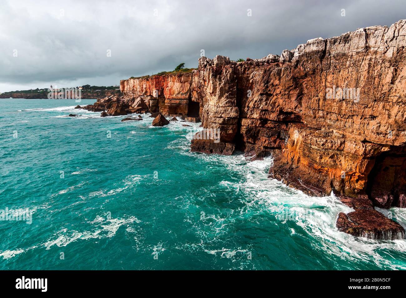 Rocks and ocean before the storm. Amazing view at Boca do Inferno, Hell's Mouth – Cascais, Portugal Stock Photo