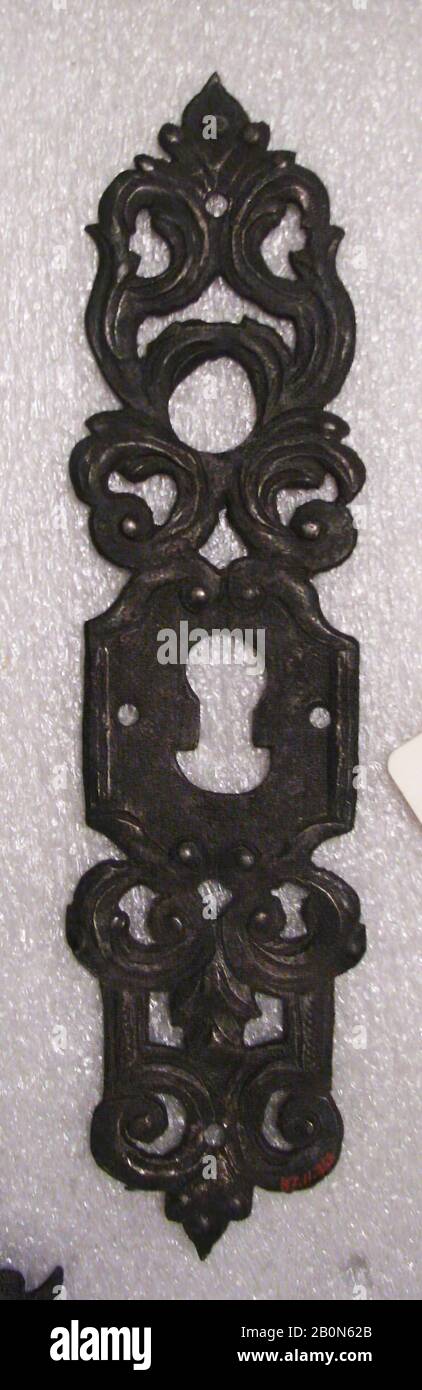 Escutcheon of lock, German, 18th century, German, Iron, 8 1/4 × 1 7/8 in. (21 × 4.8 cm), Metalwork-Iron Stock Photo
