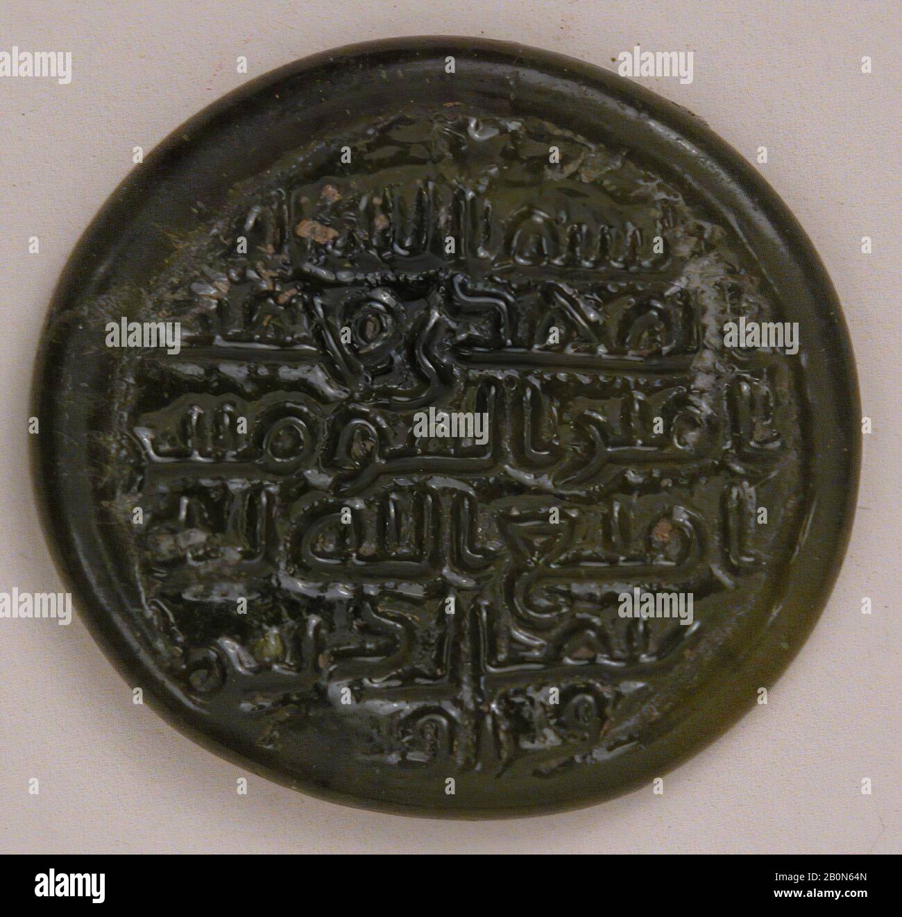 Coin Weight Coin Weight A D 778 Country Of Origin Egypt Glass Stamped H 1 8 In 0 3 Cm Diam 1 3 16 In 3 Cm Wt 0 15 Oz 4 25g Glass Stock Photo Alamy