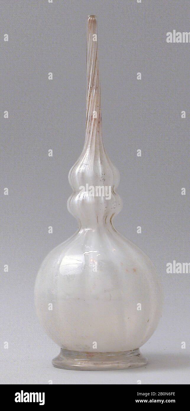 Bottle, probably 18th–19th century, Attributed to Iran, Glass; mold blown, H. 7 15/16 in. (20.2 cm), Diam. 3 in. (7.6 cm), Wt. 6.504 oz (184.385 g), Glass Stock Photo