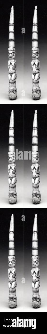 Ifa Divination Tapper, Edo peoples, 19th century, Nigeria, Court of Benin, Edo peoples, Ivory, Length 13-1/2 in., Bone/Ivory-Sculpture Stock Photo