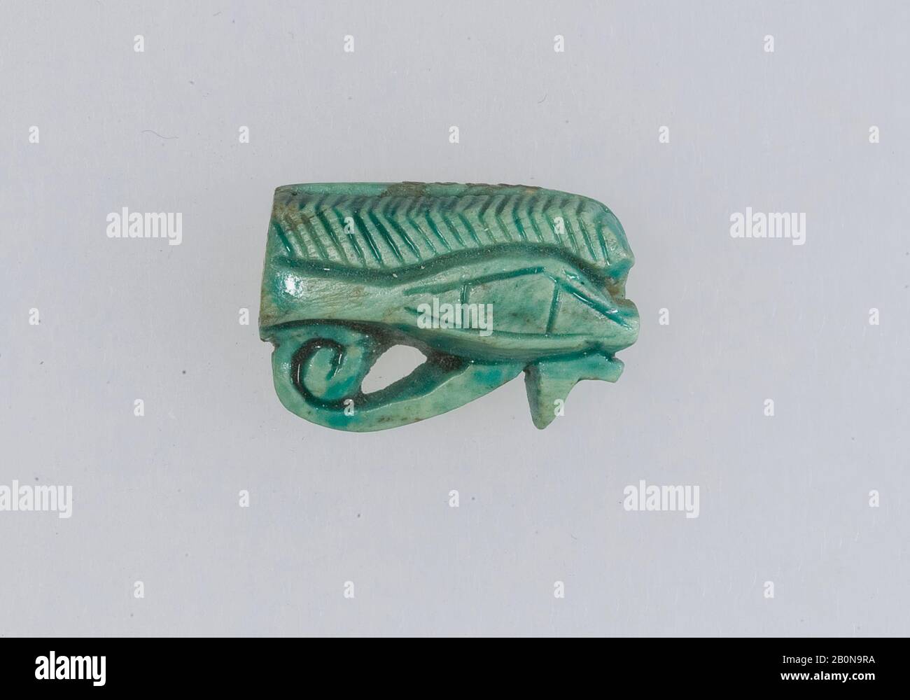 Stamp Seal in the Shape of Wedjat-Eye, New Kingdom, Dynasty 18, reign of Thutmose IV, ca. 1400–1390 B.C., From Egypt, Steatite (glazed), L. 1.5 cm (9/16 in); 1 cm (3/8 in); w. 0.5 cm (3/16 in Stock Photo