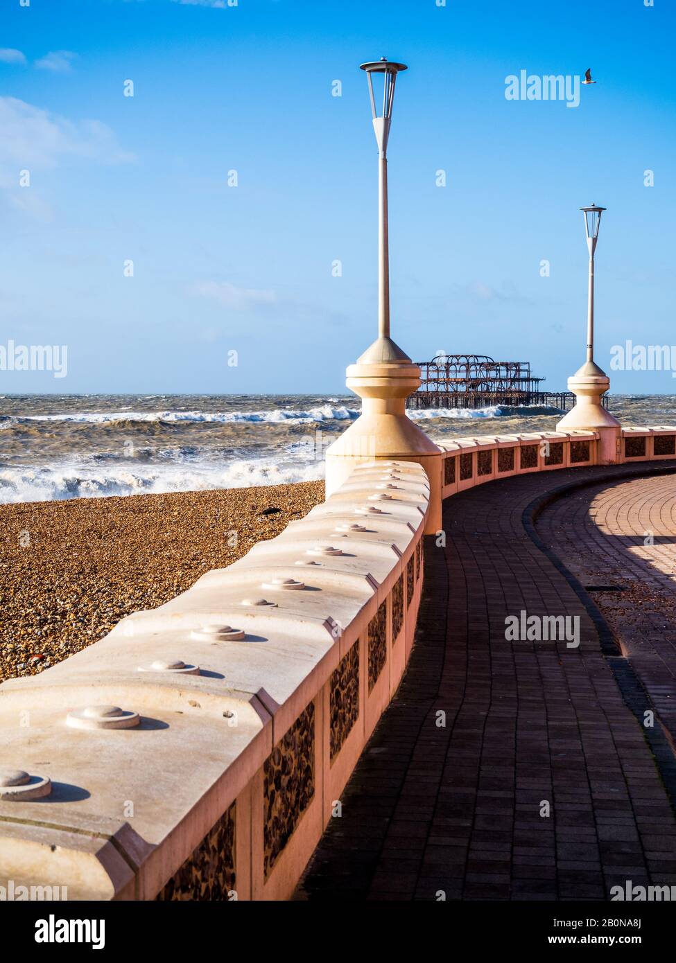Promenade and west pier in Brighton, UK Stock Photo