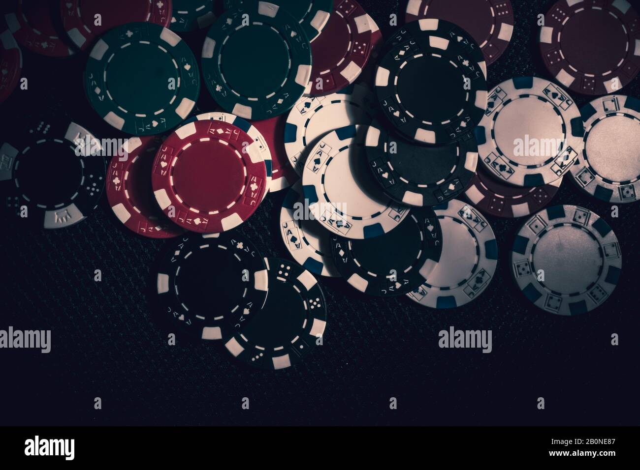 Large pot of Poker chips at gambiling hall Stock Photo Alamy