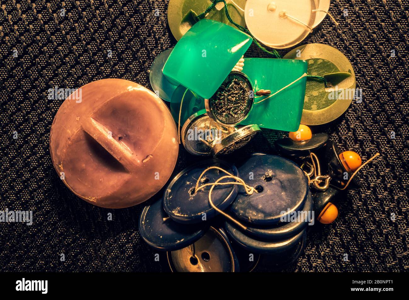 Beading mat with finished designs, needles and colourful beads Stock Photo  - Alamy