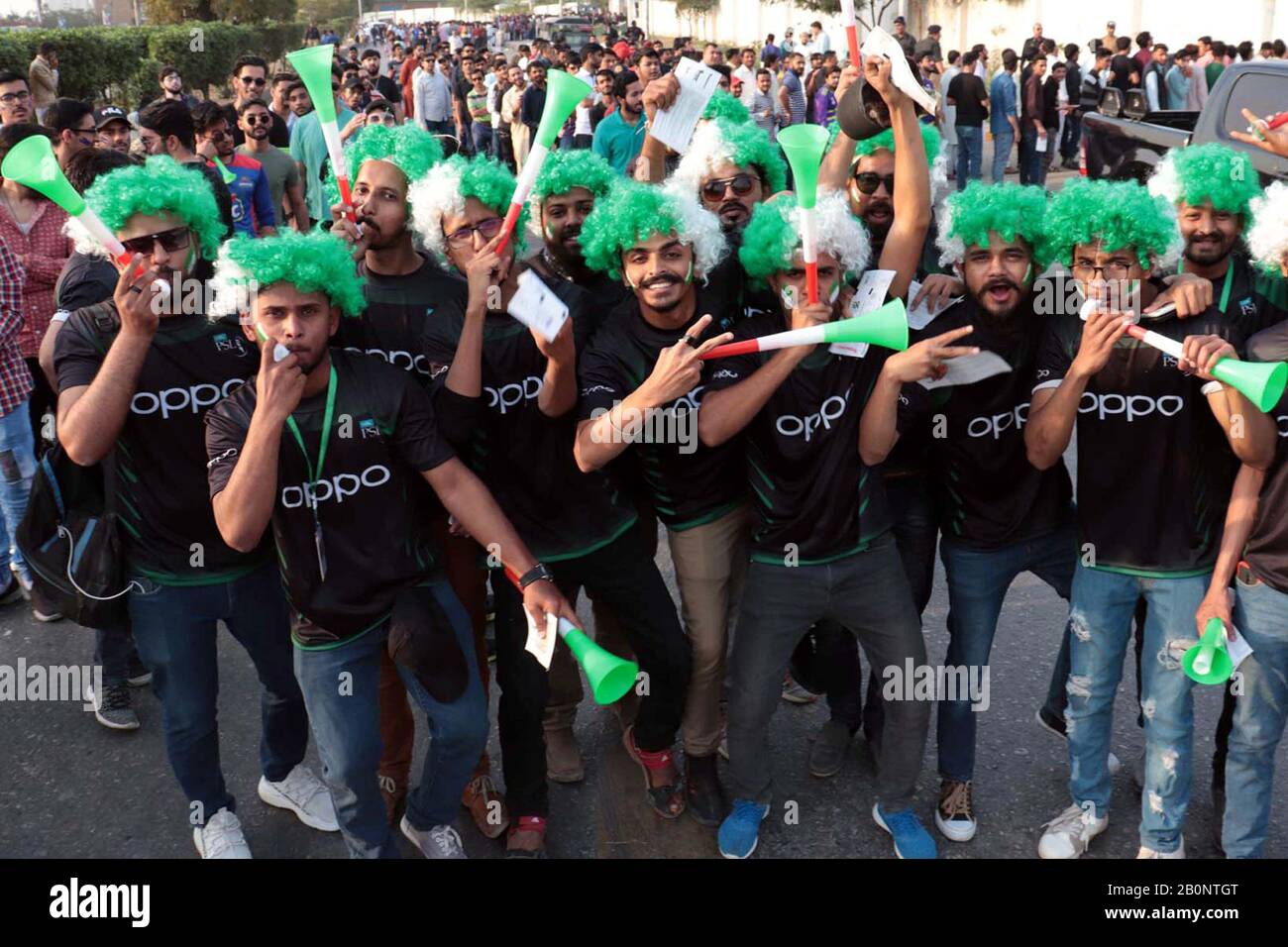 Karachi, Pakistan. 20th Feb, 2020. Pakistani cricket fans are seen as they wait to enter the National Stadium prior to the opening ceremony of the Pakistan Super League (PSL), the country's annual cricket tournament, in Karachi, Pakistan, on Feb. 20, 2020. Credit: Str/Xinhua/Alamy Live News Stock Photo